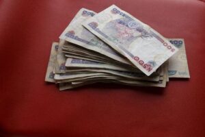 2025 10 09t155555z 1 lynxnpel980u8 rtroptp 3 nigeria naira investors