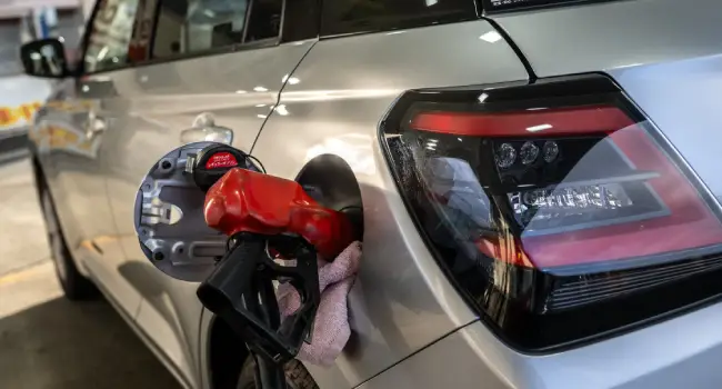A car at a filling station buying gas