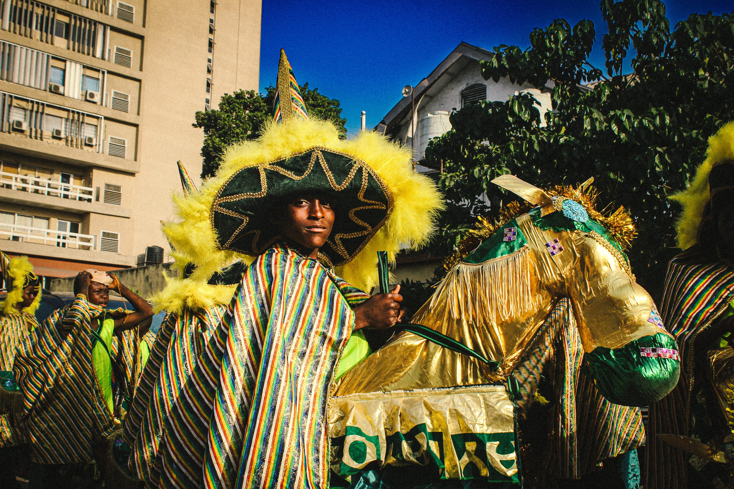 IMAGE SIX A young member of the Campos Caretta Fanti Carnival Troupe in an elaborate costume featuring a hat and a makeshift horse 2022 scaled 1
